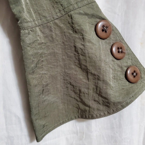 A unique jacket by Design Today's, in an army green color with a shiny fabric. - Picture 5 of 6